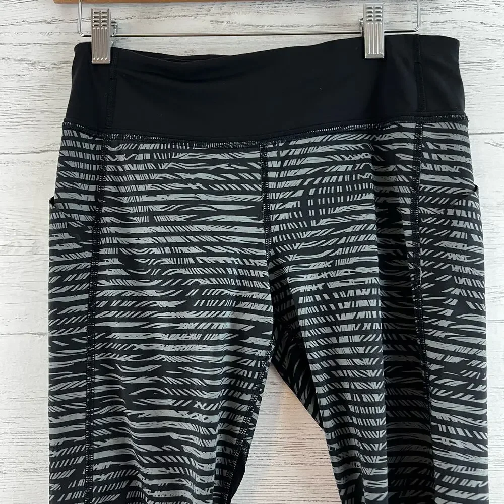 Lululemon Black and Gray Cropped Thigh Pocket‎ Leggings Size 6